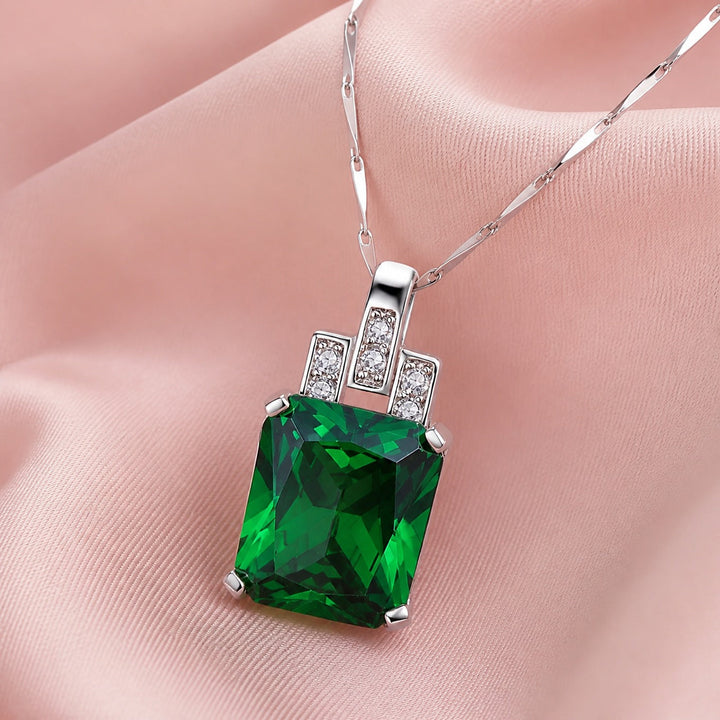 Collier Éternel en Or Blanc avec Émeraude