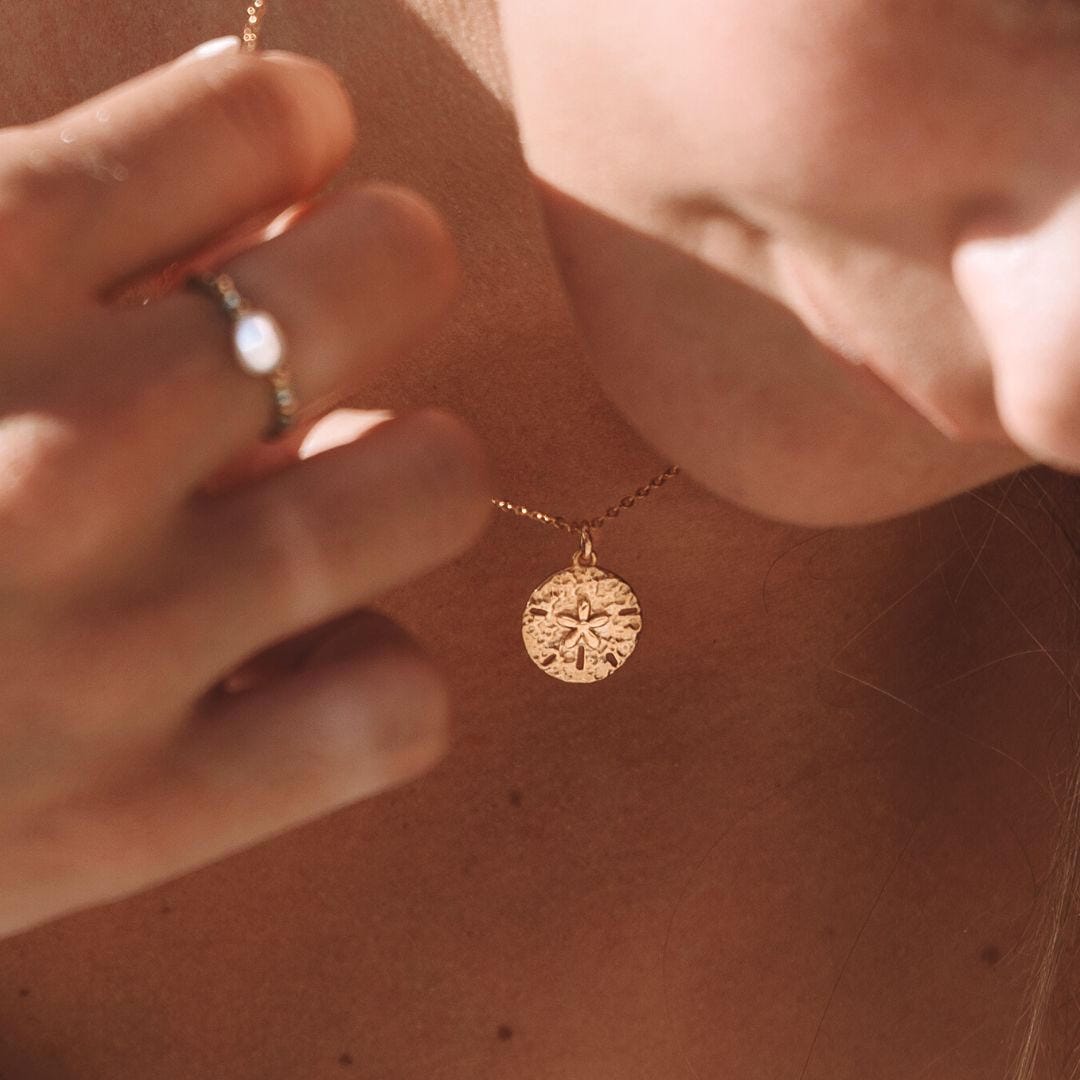 Collier Charme Dollar de Sable